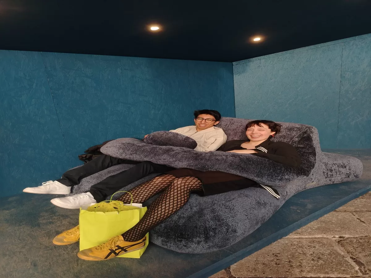 Two participants trying a game of the exhibition