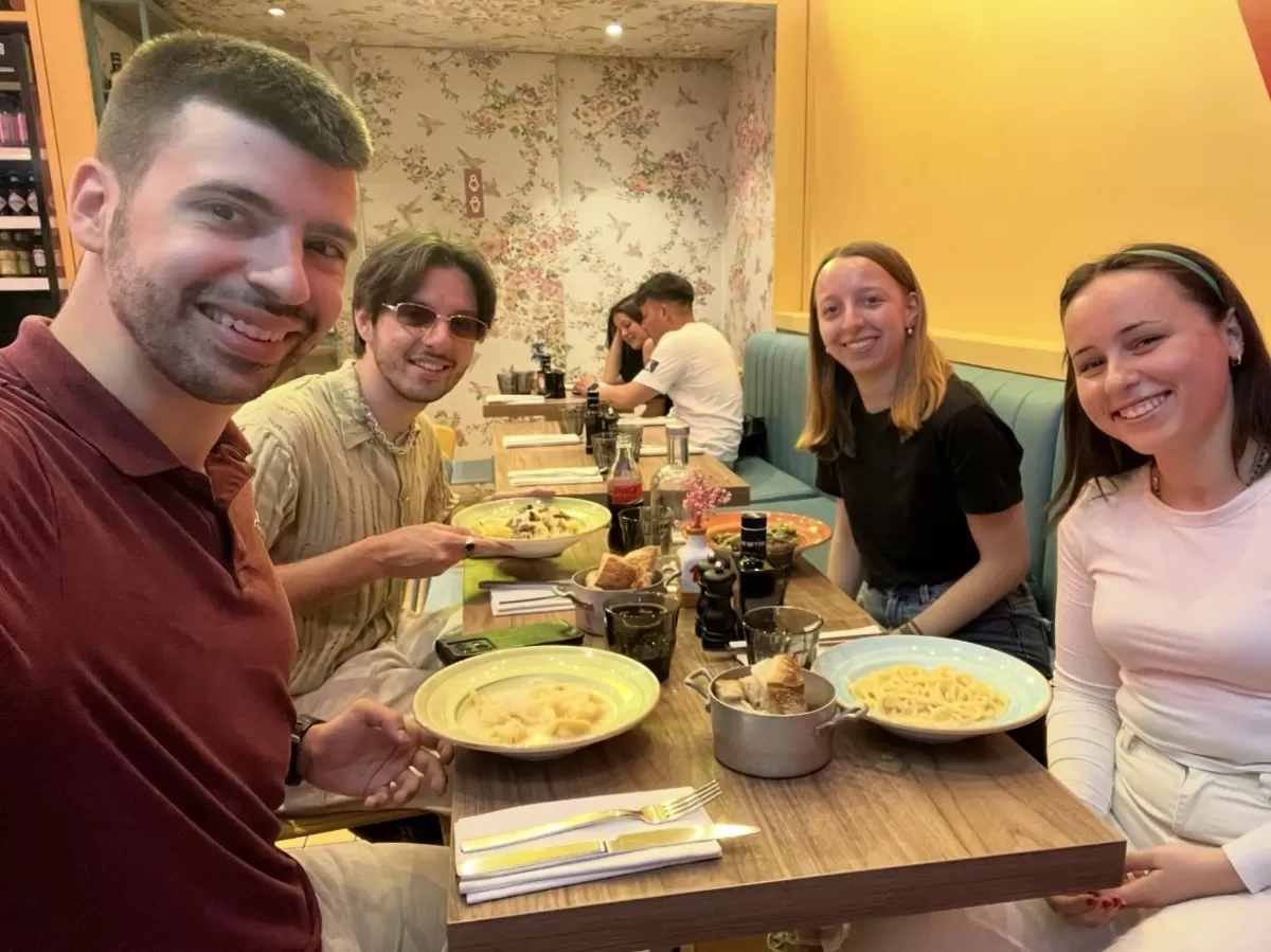 Volounteers and international students during the even