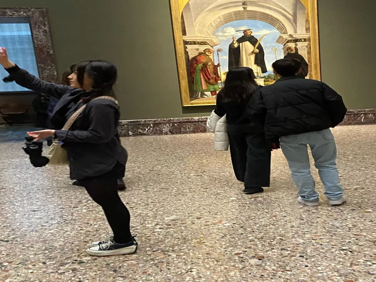 Participants in front of a painting