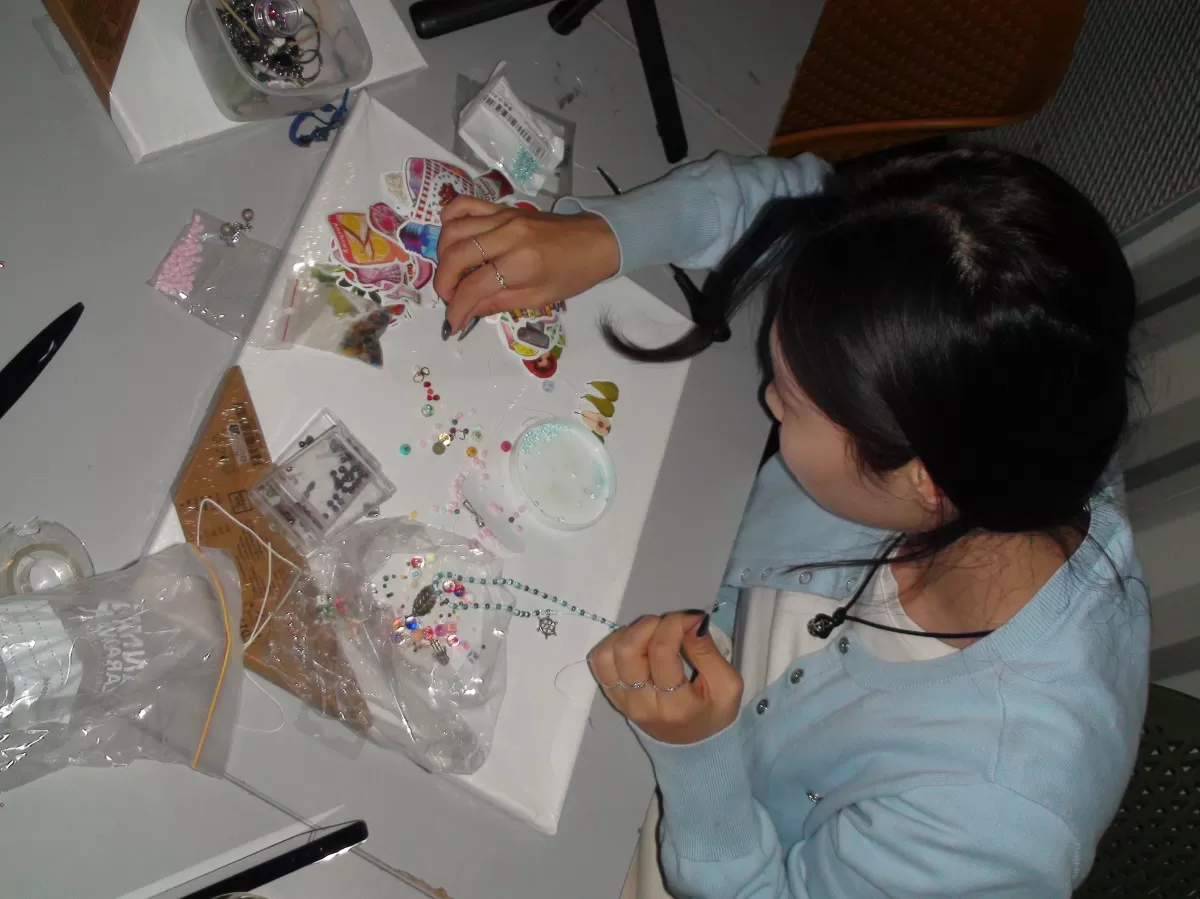 a person painting on a canvas