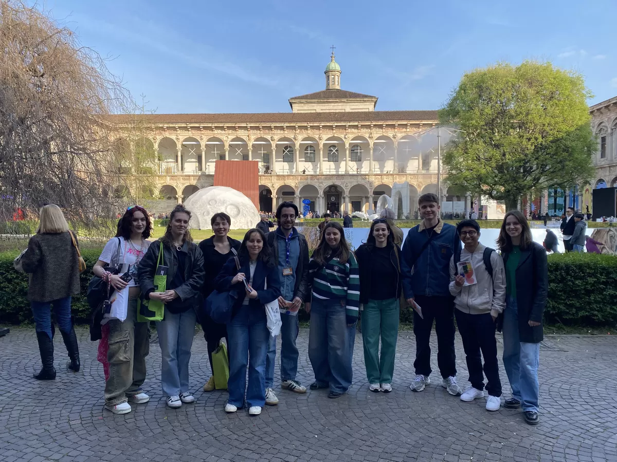group photo in front of the exhibition