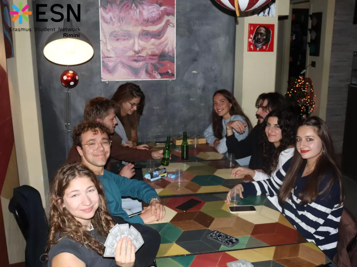 erasmus students playing cards in group