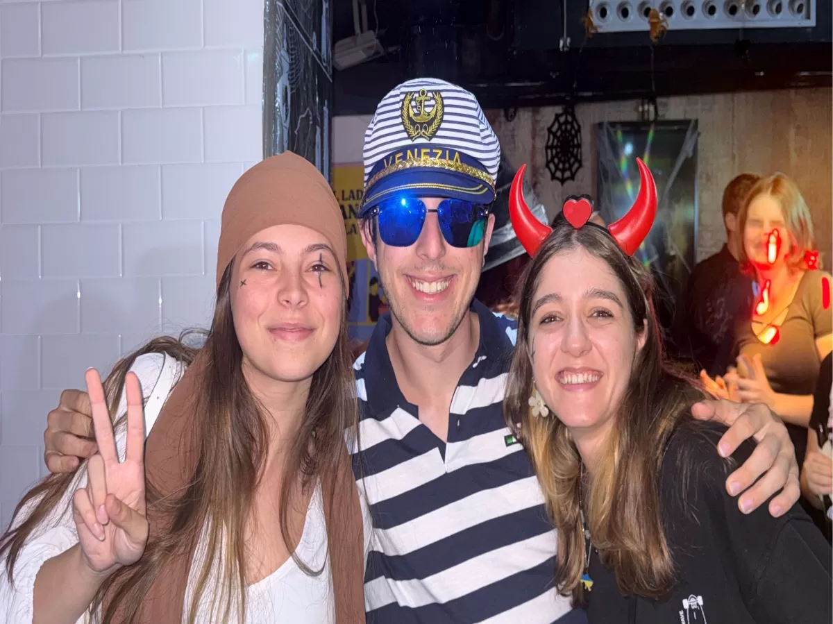 3 people posing wearing different accesories