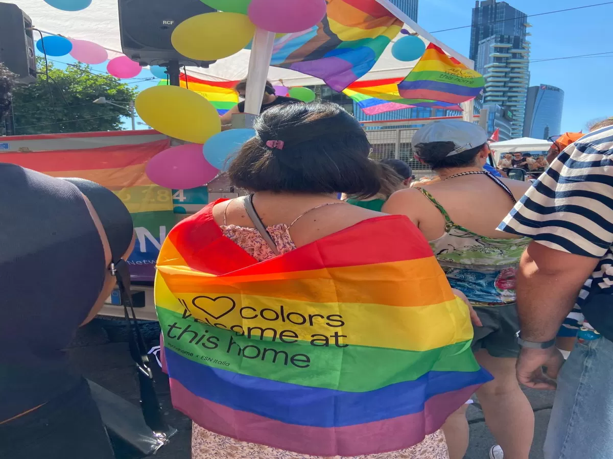 ESN volunteer "wearing" a rainbow flag