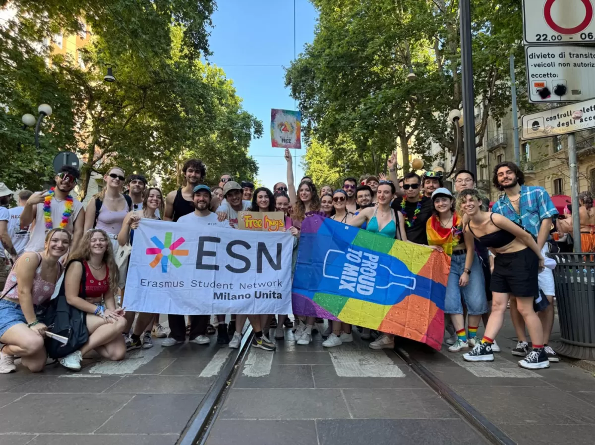 ESN volunteers of Milano Unita posing during Milano Pride with ESN Milano Unita flag