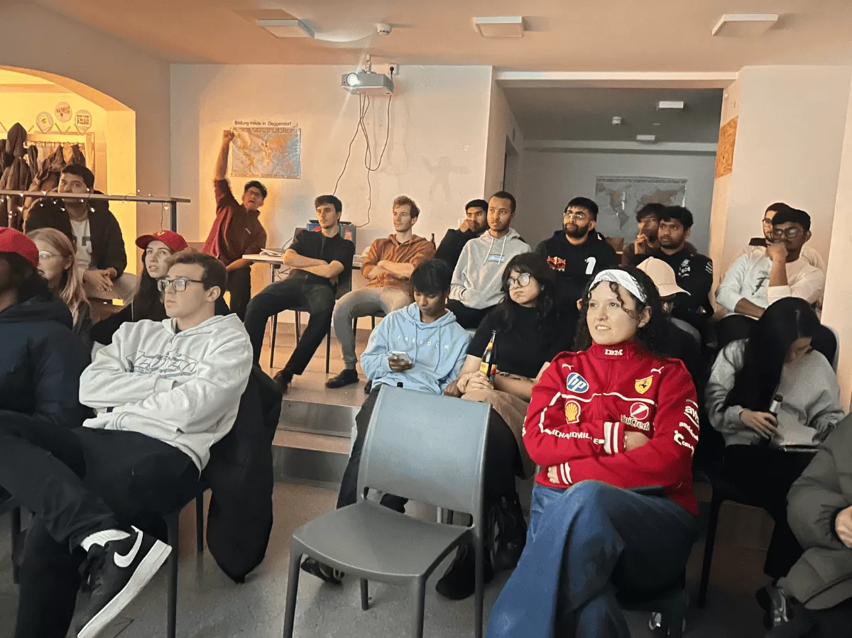 Group watching F1 race