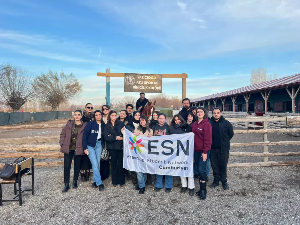Our members in front of the gate for the horse riding area.