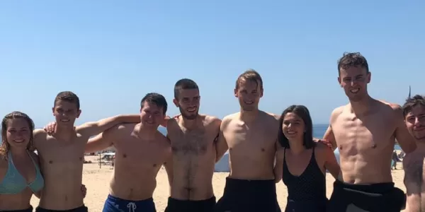 international students on the beach