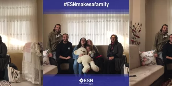 Group of ESNers meeting with a family in an apartment room.