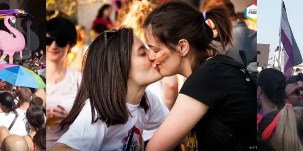 Posters, people and two girls kissing from the Tuscany Pride parade