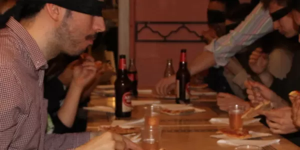 Group of the students while eating blind folded