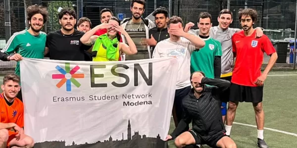 International Students covering their eyes (with ESN flag)