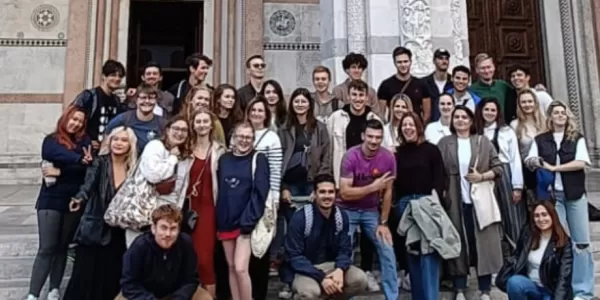 International students in front of a church in Lucca.