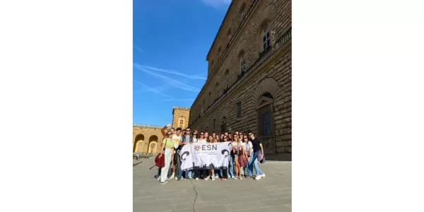 ESN Florentia poses for a photo in front of Palazzo Pitti