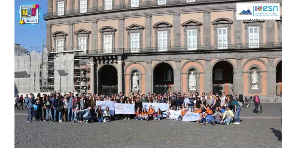 A group photo taken in Piazza del Plebiscito while showing the ESN's flag