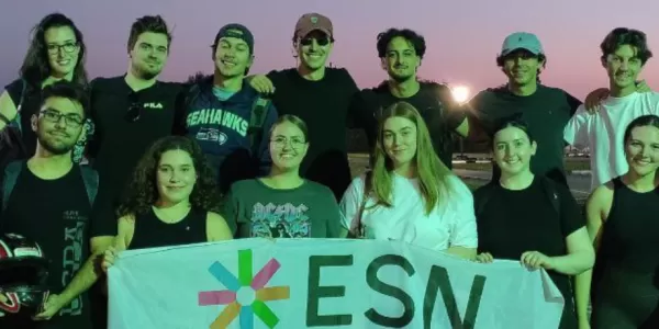 Group of international students with ESN Modena flag