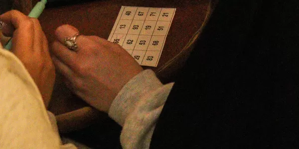 A photo of Erasmus holding a bingo card