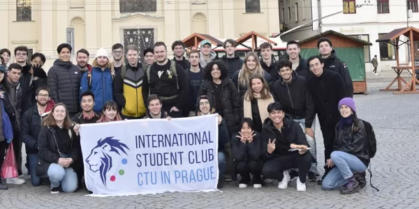 A group of international students standing on the main square.