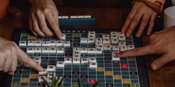 hands playing board games