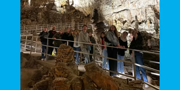 Group of international students inside the Grotta Gigante