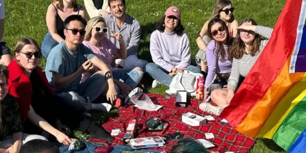 Group of international students and coordinators during the rainbow picnic