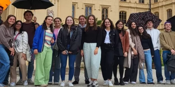 A group photo in front of the castle