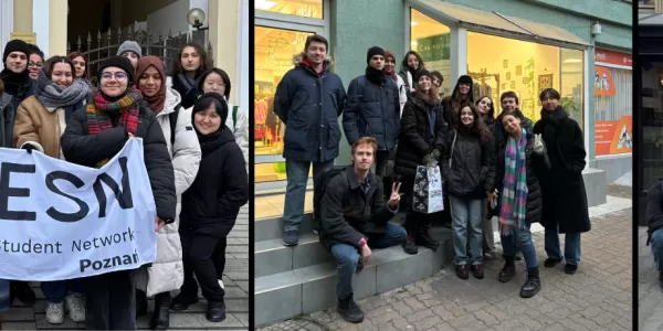 Event participants in front of three different second-hand stores.