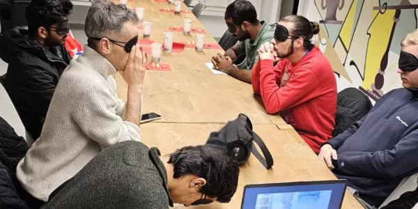 participants wearing a sleeping mask listening to an audio descriptive video