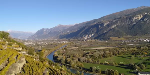 Image of a valley surrounded by mountains