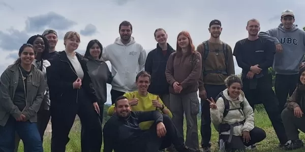 participants posing for a picture in nature