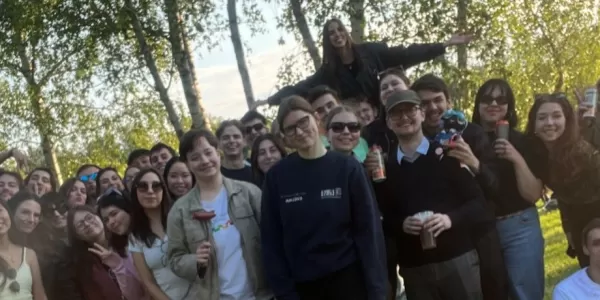 all the participants together taking picture by the venue