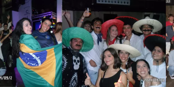 International students showing their flags and regional clothing