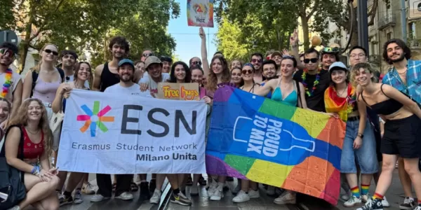 ESN volunteers posing for a picture at Milano Pride with ESN Milano Unita flag