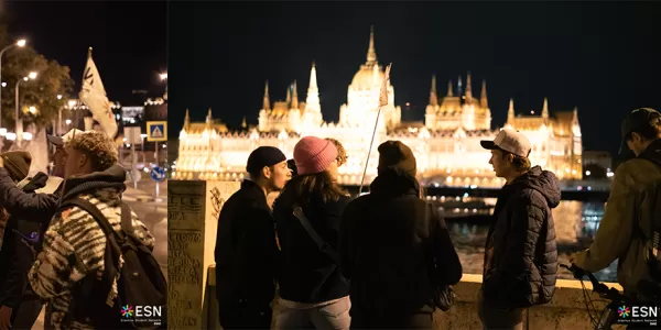 Students standing in front of statues