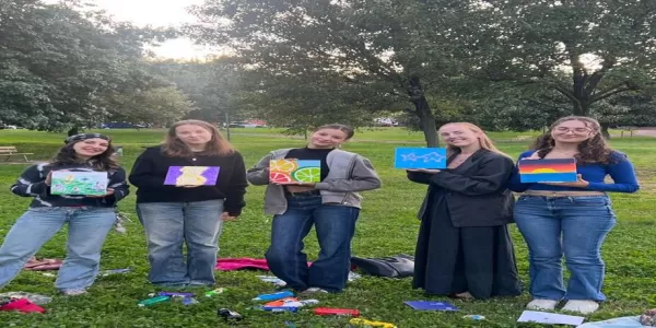 Girls' showing their finished artworks