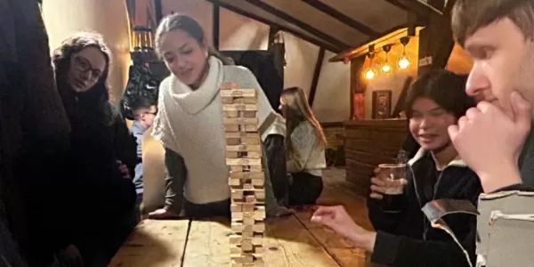 People playing Jenga