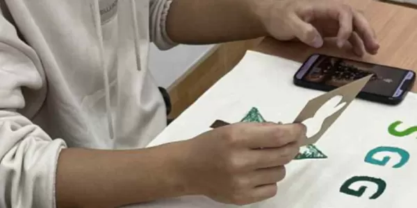 Students making totebags