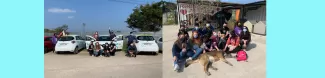 The ERASMUS students with some of the dogs from the shelter and with the cars that the company Guppy lent us.