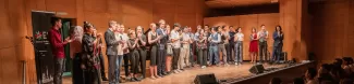 The performers of the TUMi Summer Concert standing on stage after the concert