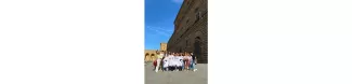 ESN Florentia poses for a photo in front of Palazzo Pitti