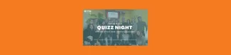 Photo of a group of people playing in the quiz night