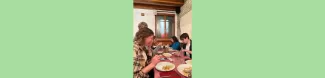 volunteers and Erasmus students eating
