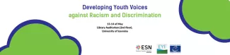 It’s a white background with two purple -green cloudes, 3 logos and the title Developing Youth Voices Against Racism & Discrimination