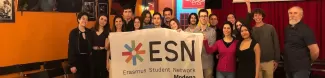 people together with ESN flag