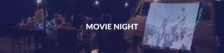 A group of people watching a movie is potrayed faded behing ESN's dark blue colour. Movie night is written in the middle of the cover picture.