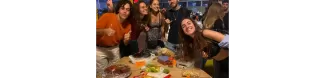 Erasmus and Italian students eating homemade food