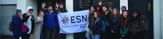 A group picture holding the ESN Utrecht flag