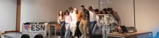 Group of students dancing to a typical dance of Spain.