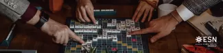 hands playing board games