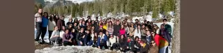Group picture in front of Lake Antorno
